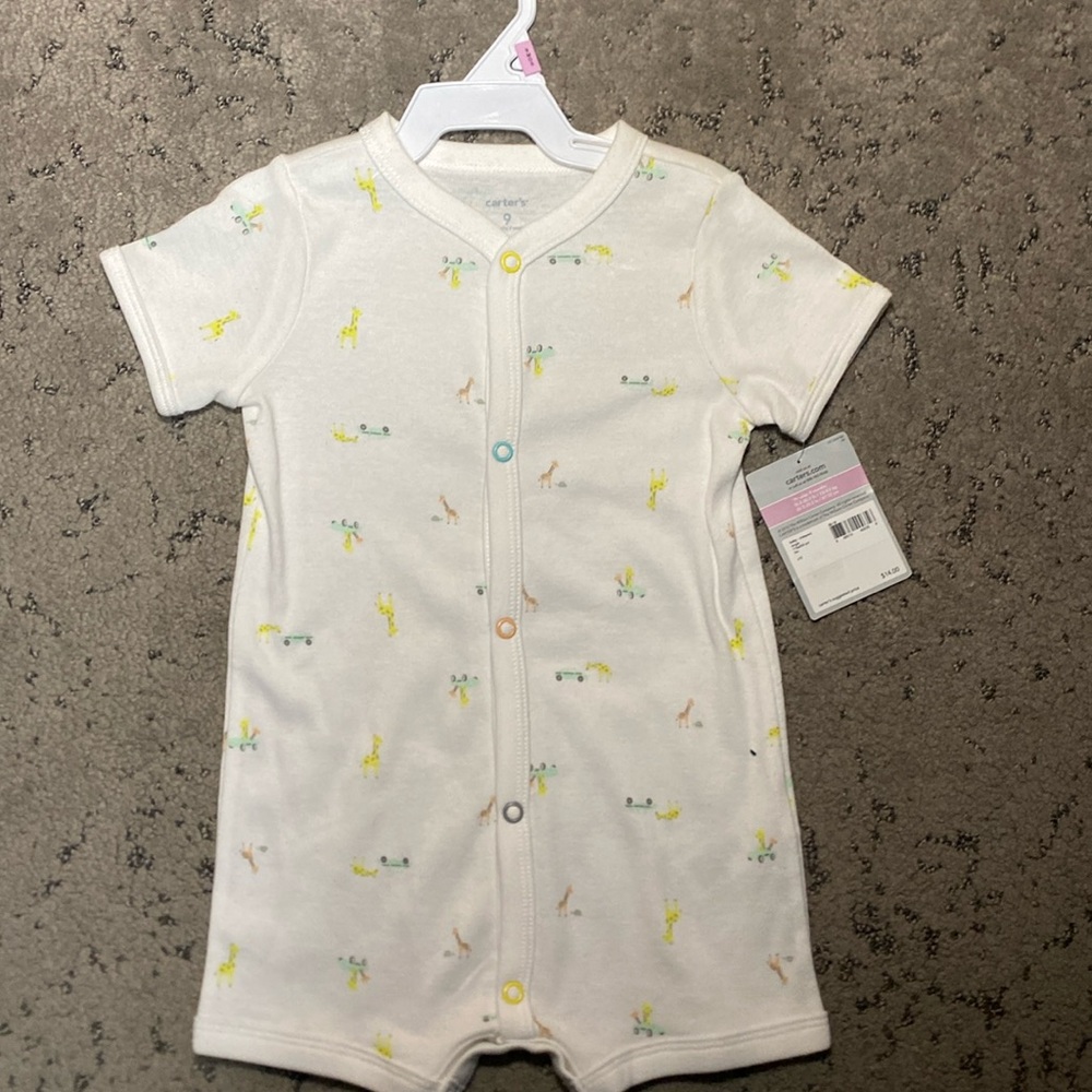 Carters Baby onesie cute giraffe pattern with easy secure buttons
